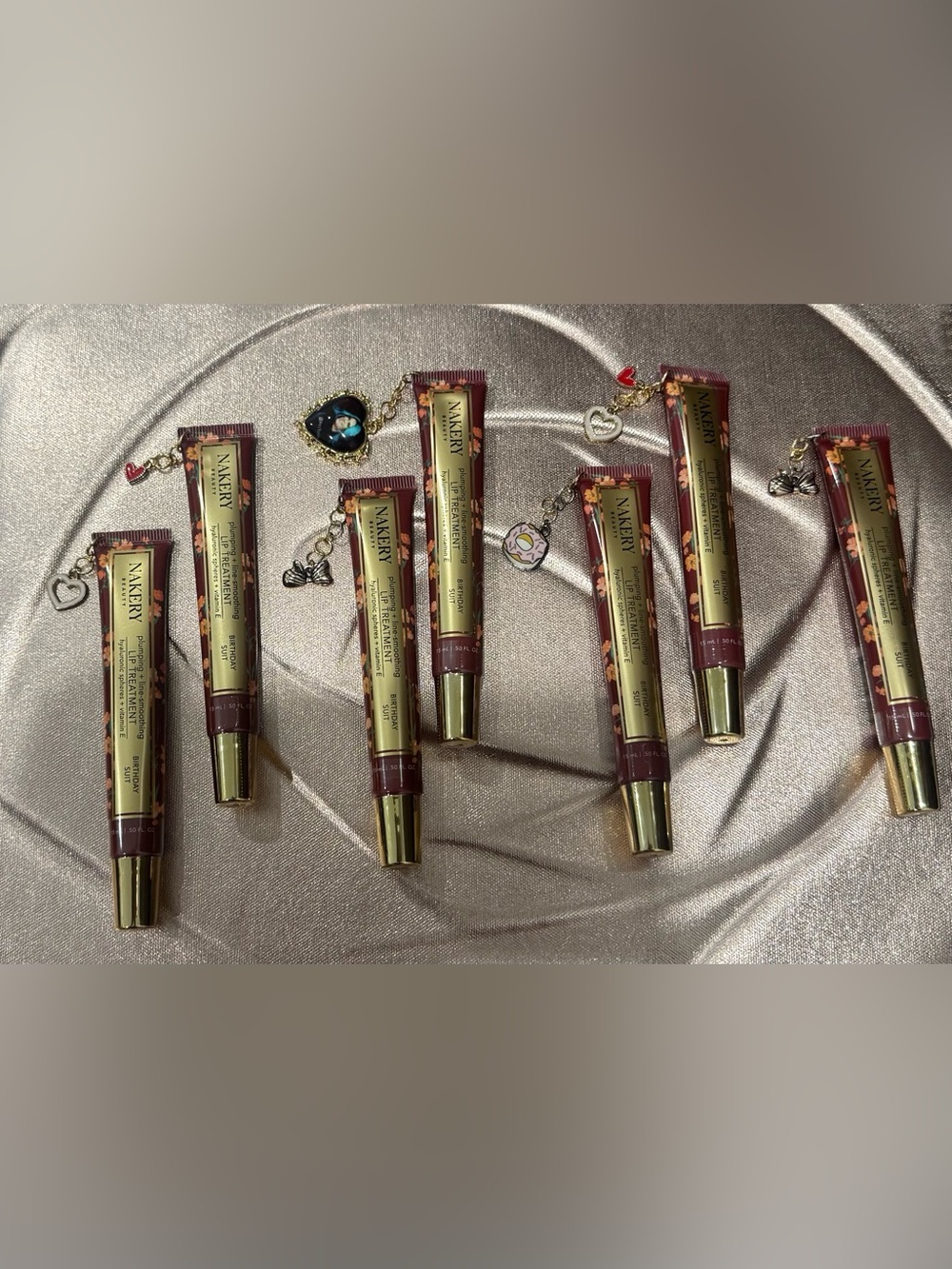Nakery Beauty Plumping Lip Treatment Birthday Suit with Custom charm